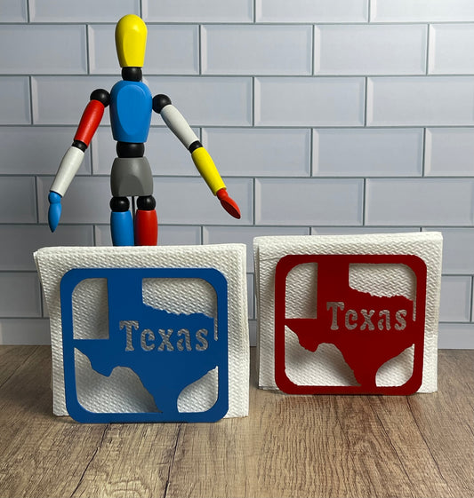 Handmade Texas metal napkin holders in red or blue. Plasma-cut metal.