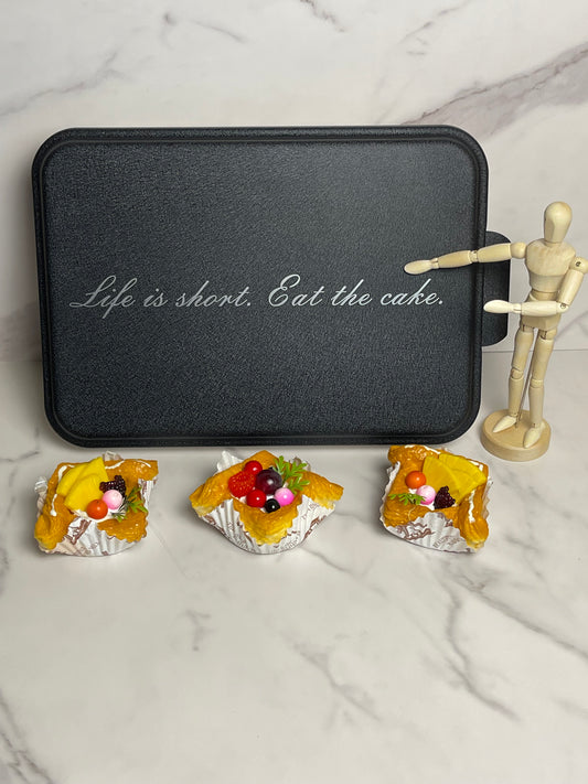 9' x 13" aluminum cake pan with laser engraved lid that snaps on. 2 inch depth with black lid saying, "Life is short. Eat the cake." Great gift for people that love baking! Also great for cupcakes and other snacks. Makes storage simple.